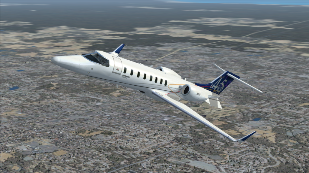 LearJet 45 Climbing over the city