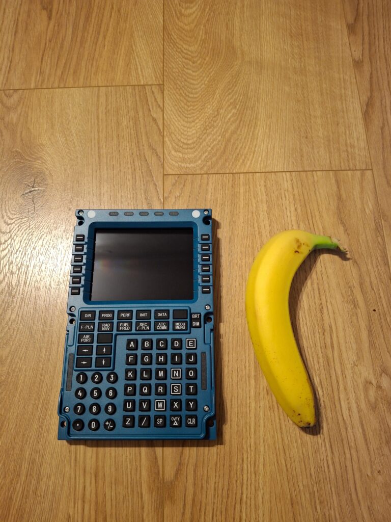 Winwing MCDU with a banana for scale