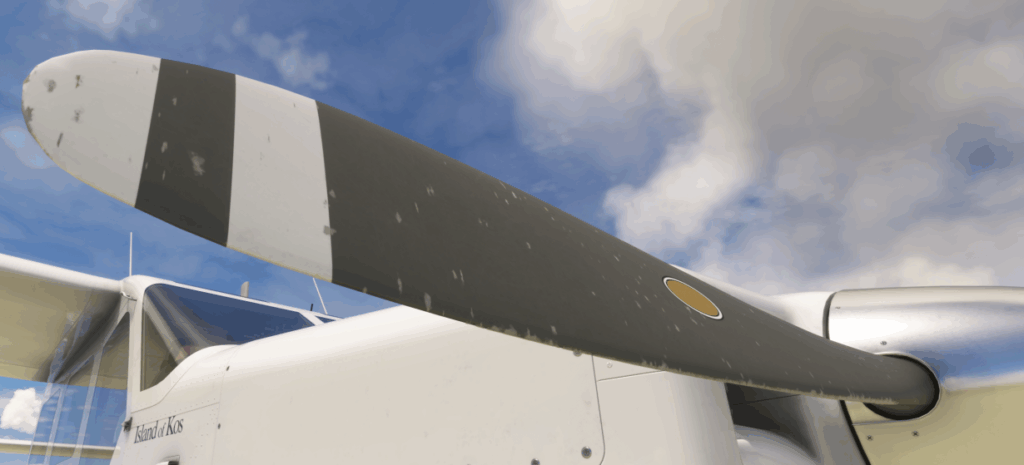 A close-up of the Airvan's propeller, showcasing some wear and tear.