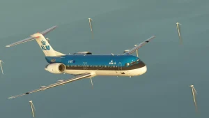 In sim view of Just Flight's Fokker F100 in KLM livery flying over the North Sea.