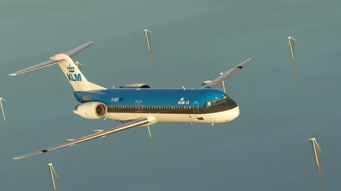 In sim view of Just Flight's Fokker F100 in KLM livery flying over the North Sea.