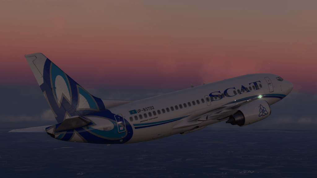 737-500 flying in sunset