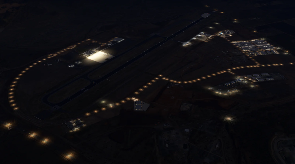 Night lighting illuminates the airfield in MSFS at night.