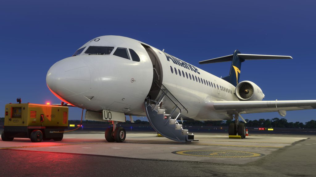 In-sim view of Just Flight F70 for MSFS with airstairs opened. 