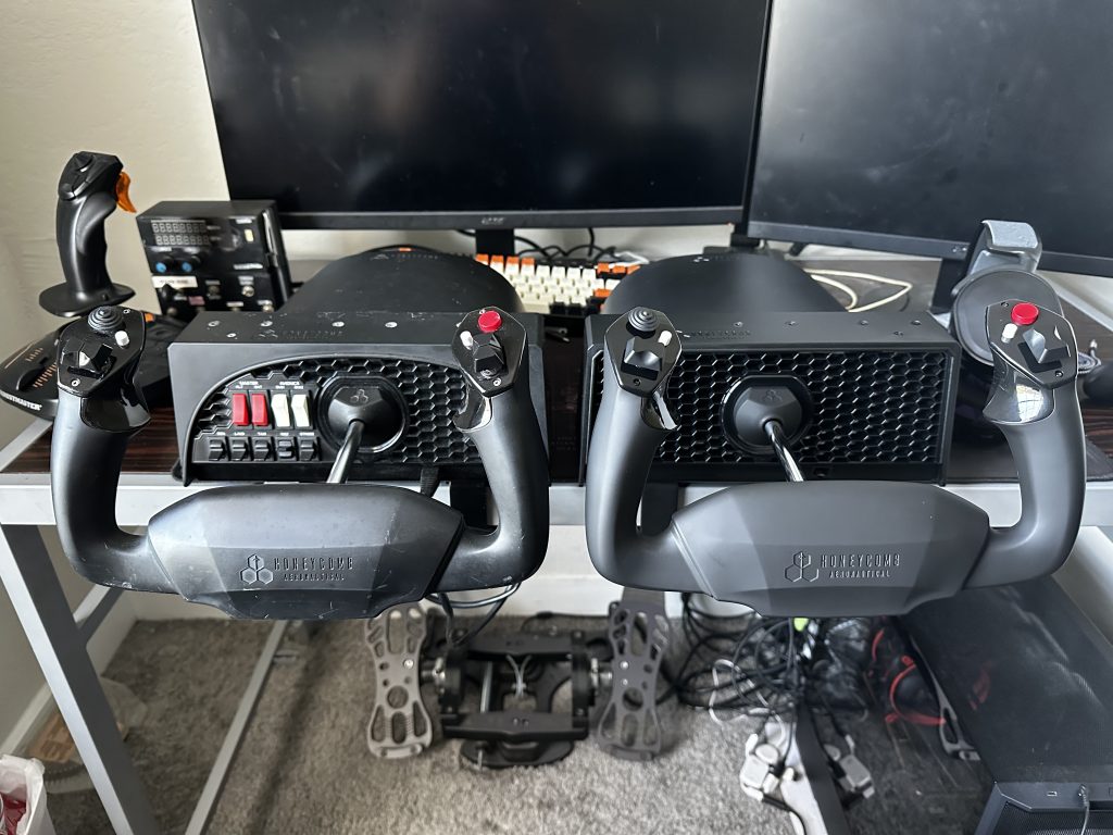 Image showing the Alpha Lite and the original Alpha mounted on a desk side-by-side