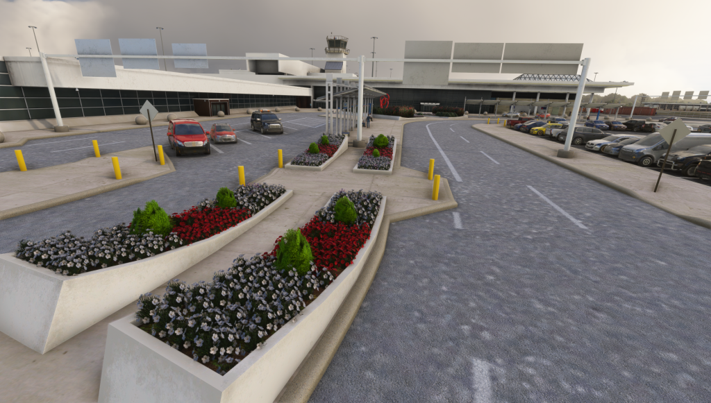 Vehicle drop-off/pickup area in front of the KLIT airport terminal entrance