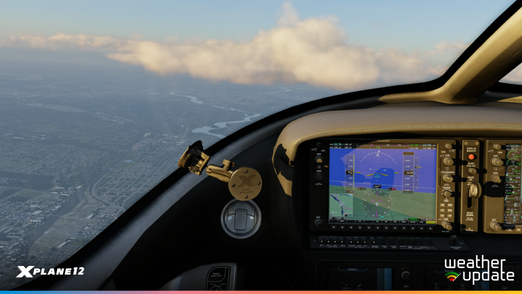 Cockpit view showing updated G1000 weather and terrain display.