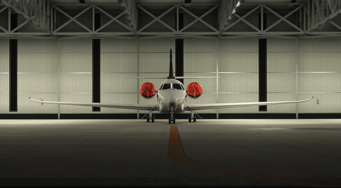 Front view of Skyward Simulations Cessna Citation C680 Sovereign+ inside hangar for MSFS