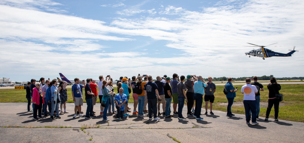 FlightSimExpo attendees participating in an airport tour activity