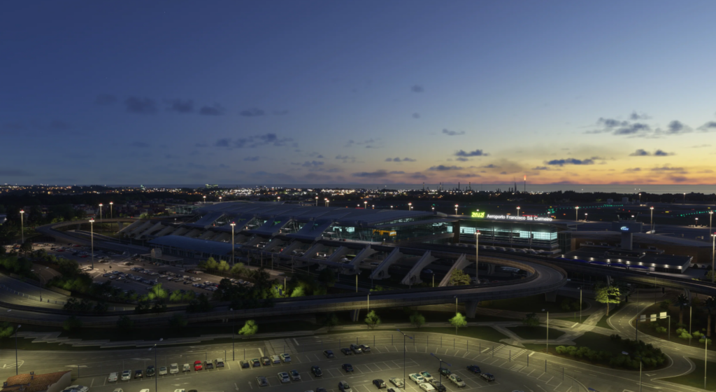 Porto Airport terminal at night with realistic lighting and city skyline in MK Studios MSFS 2024 scenery
