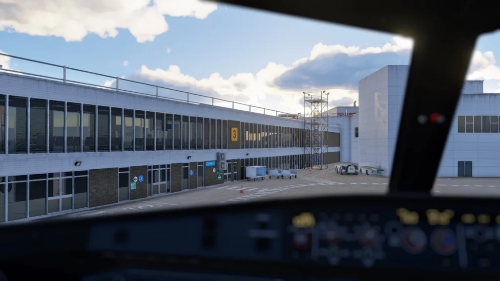 Pilot cockpit view approaching Cardiff Airport terminal in X-Plane 12, highlighting immersive airport layout and realistic ground detail by SoFly
