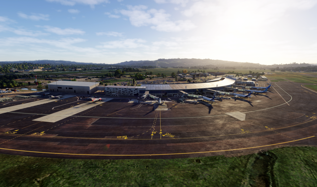 Overview the terminal and parked aircraft on the apron of Martinique Aim&eacute; C&eacute;saire International Airport in Microsoft Flight Simulator