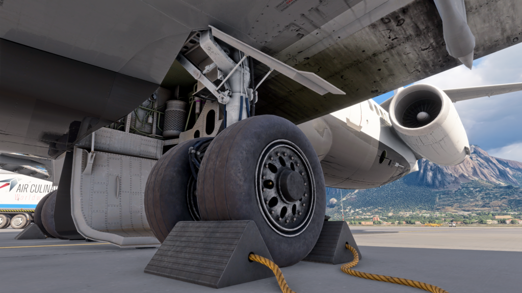 Close-up of the aircraft&rsquo;s landing gear and engine nacelle on the apron
