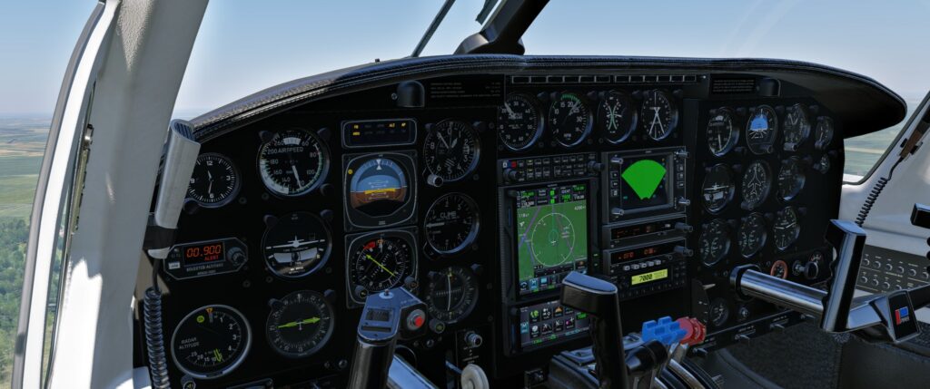 CIS Piper Chieftain cockpit with steam gauges, GPS displays, and weather radar