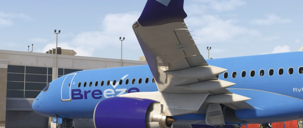 Wing and fuselage details of the Synaptic A220-300 in Breeze Airways livery.