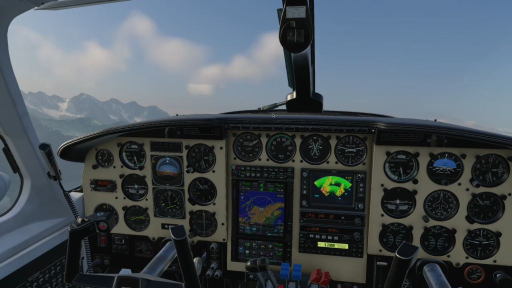 CIS Piper Chieftain cockpit in flight over Alaska, showing the aircraft’s instrument panel and avionics