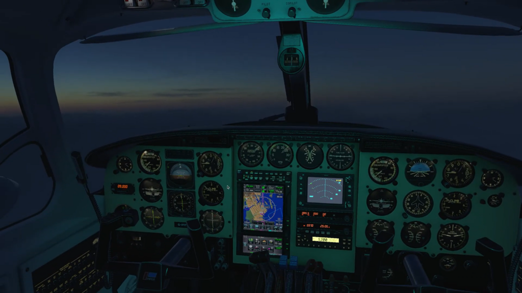 Night-lit Piper Chieftain cockpit with illuminated instruments over a dark twilight sky