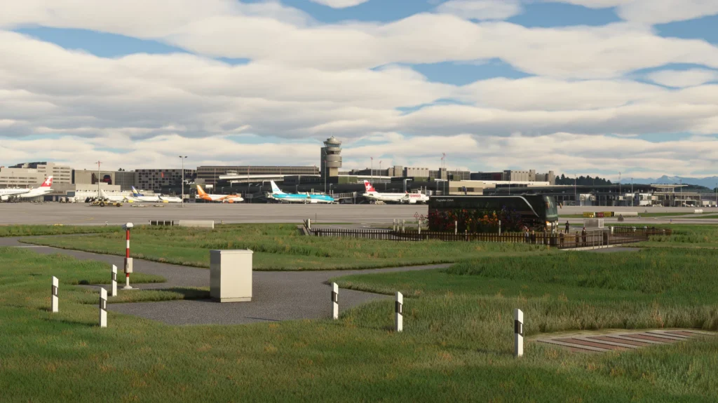 MK Studios Zurich Airport scenery in Microsoft Flight Simulator 2020 and 2024, showing the terminal, control tower, parked aircraft and airport bus across the airfield.