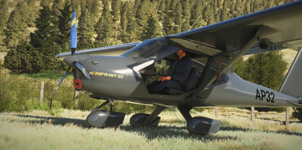 GotFriends Aeroprakt A-32 Vixxen on a grass field with trees in the background