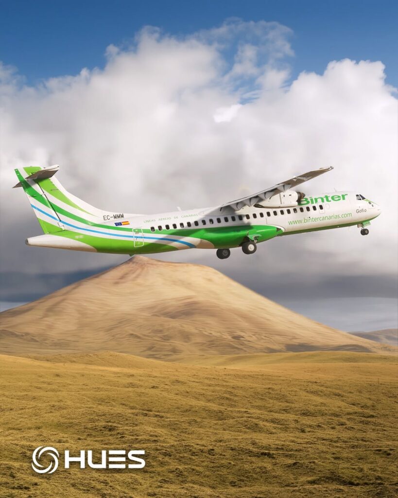 Image of ATR 72 in Binter Canarias livery soaring through the air with a mountain and large cloud in the background