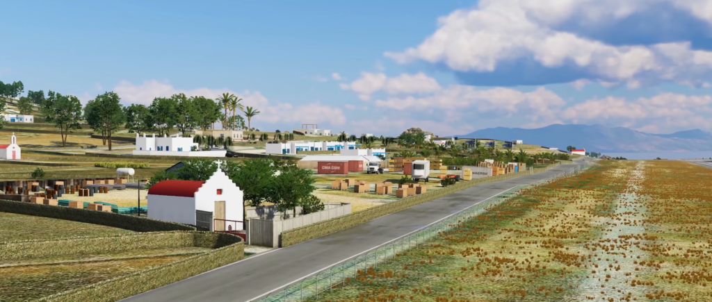View of a road, vegetation and characteristic buildings in Mykonos in X-Plane 12