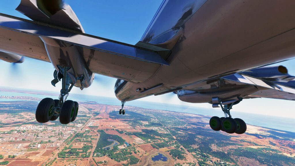 Undercarriage view of the Nemeth Designs Ilyushin Il-18D on approach to land at an airport